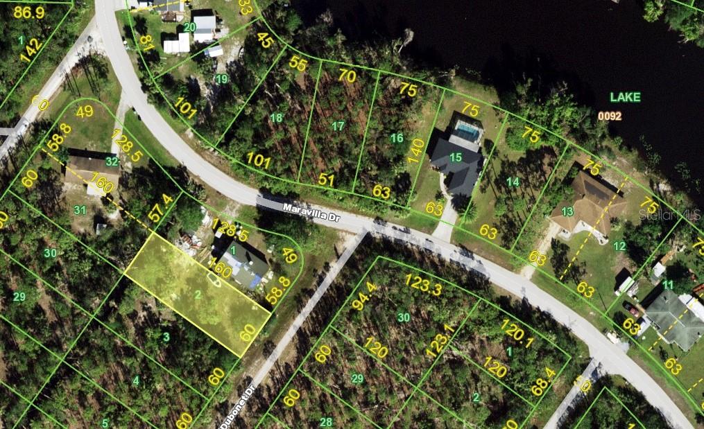 This is an aerial map showing residential lots and houses along Maravilla Drive — 27220 DUBONET DRIVE, PUNTA GORDA, FL
