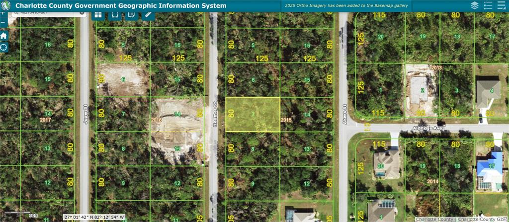 This is a digital map showing a highlighted rectangular land parcel surrounded by wooded lots — 182 HEATHER STREET, PORT CHARLOTTE, FL