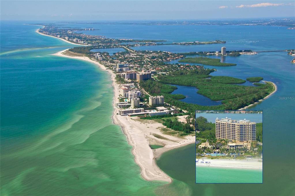 An aerial view of a coastal beach resort with an inset photo of a building — 1300 BENJAMIN FRANKLIN DRIVE UNIT 809, SARASOTA, FL