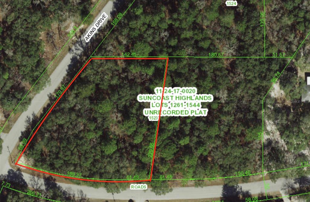 This is an aerial map showing the property boundaries of a wooded lot — 0 AKINS DRIVE, SPRING HILL, FL
