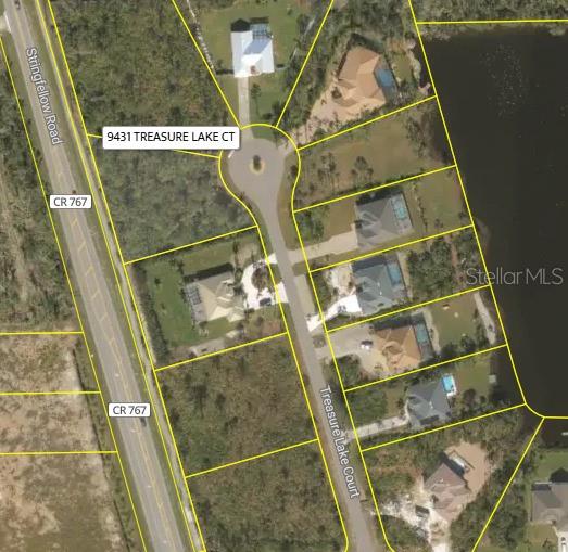 This is an aerial map showing a cul-de-sac with several residential lots and houses — 9431 TREASURE LAKE COURT, ST JAMES CITY, FL