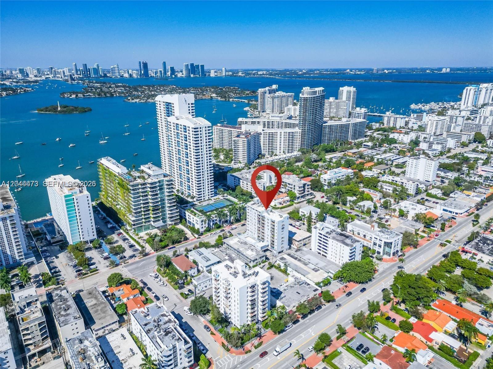 An aerial view shows a multi-story residential building marked with a red location pin — 1345 West Ave # 202, Miami Beach FL 33139, MIAMI BEACH, FL