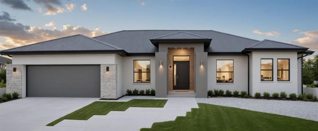 A modern single-story house with a metal roof, stucco exterior, stone accents, and a garage — 10767 KEARSARGE CIRCLE, PORT CHARLOTTE, FL