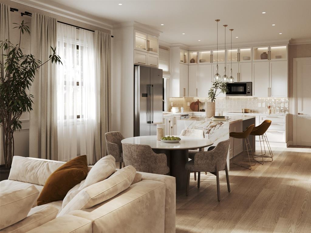 This rendering shows an open-concept kitchen and dining area with white cabinetry and marble countertops — 311 CAMPBELL STREET, PORT CHARLOTTE, FL