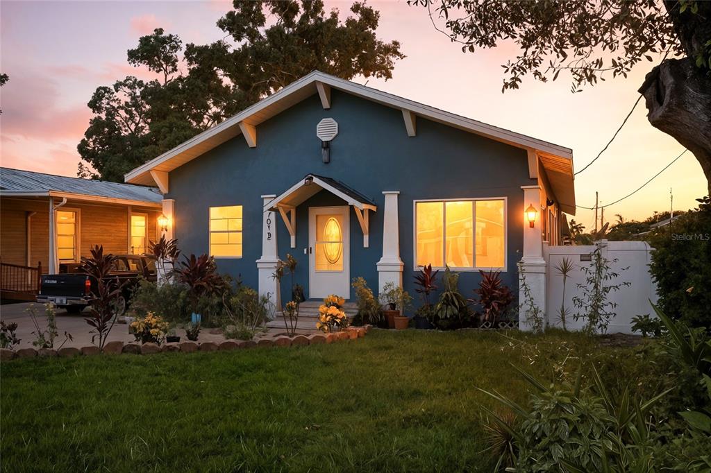 This is a floor plan showing the layout of a home with multiple rooms — 7012 N HUBERT AVENUE, TAMPA, FL
