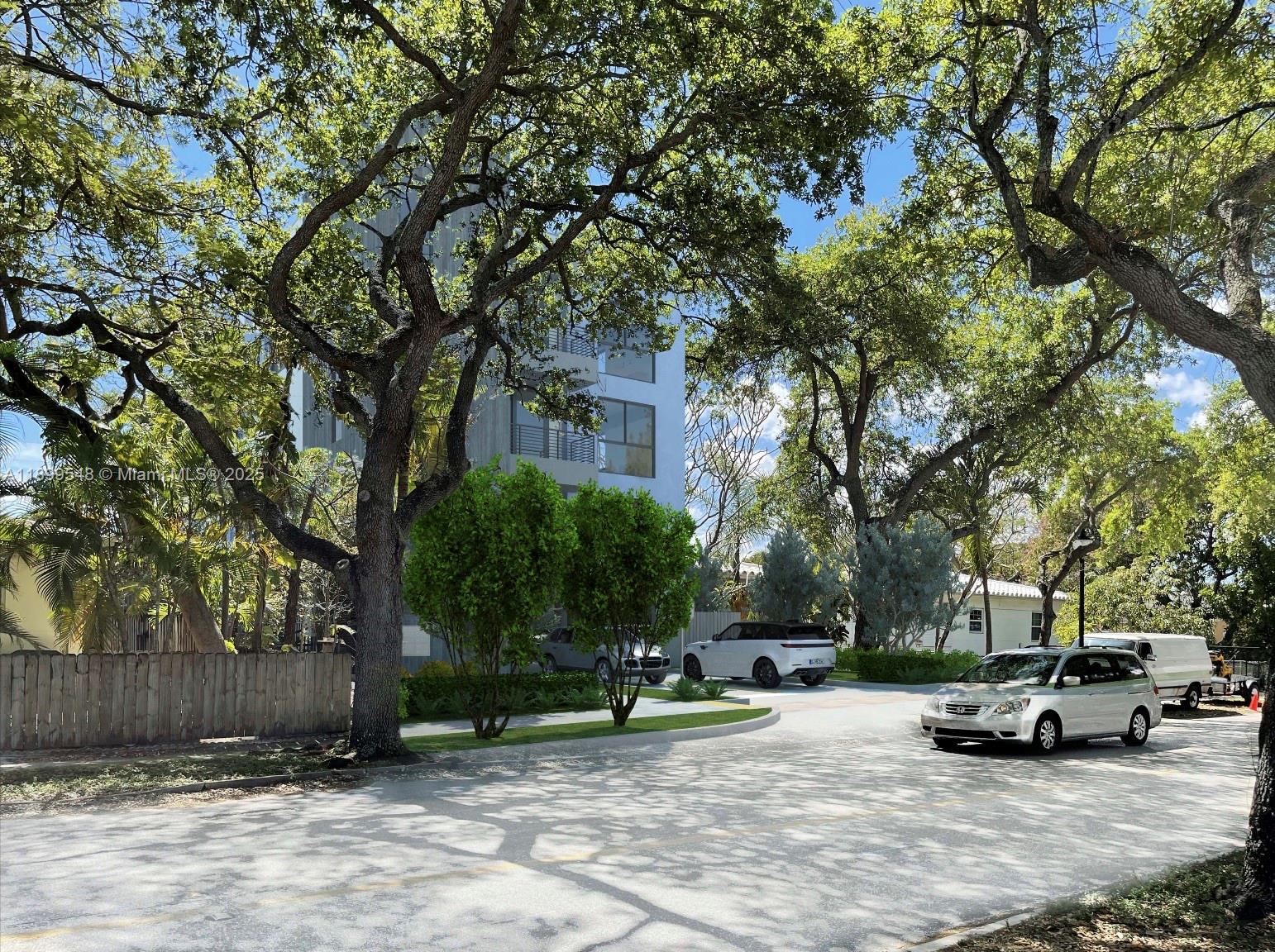 This exterior rendering shows a modern multi-story building surrounded by trees and parked cars — 1910 Washington St, Hollywood FL 33020, HOLLYWOOD, FL