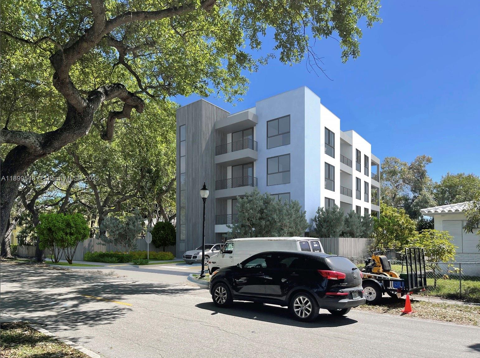 This is a rendering of a modern multi-story apartment building with a white and wood-paneled facade — 1910 Washington St, Hollywood FL 33020, HOLLYWOOD, FL