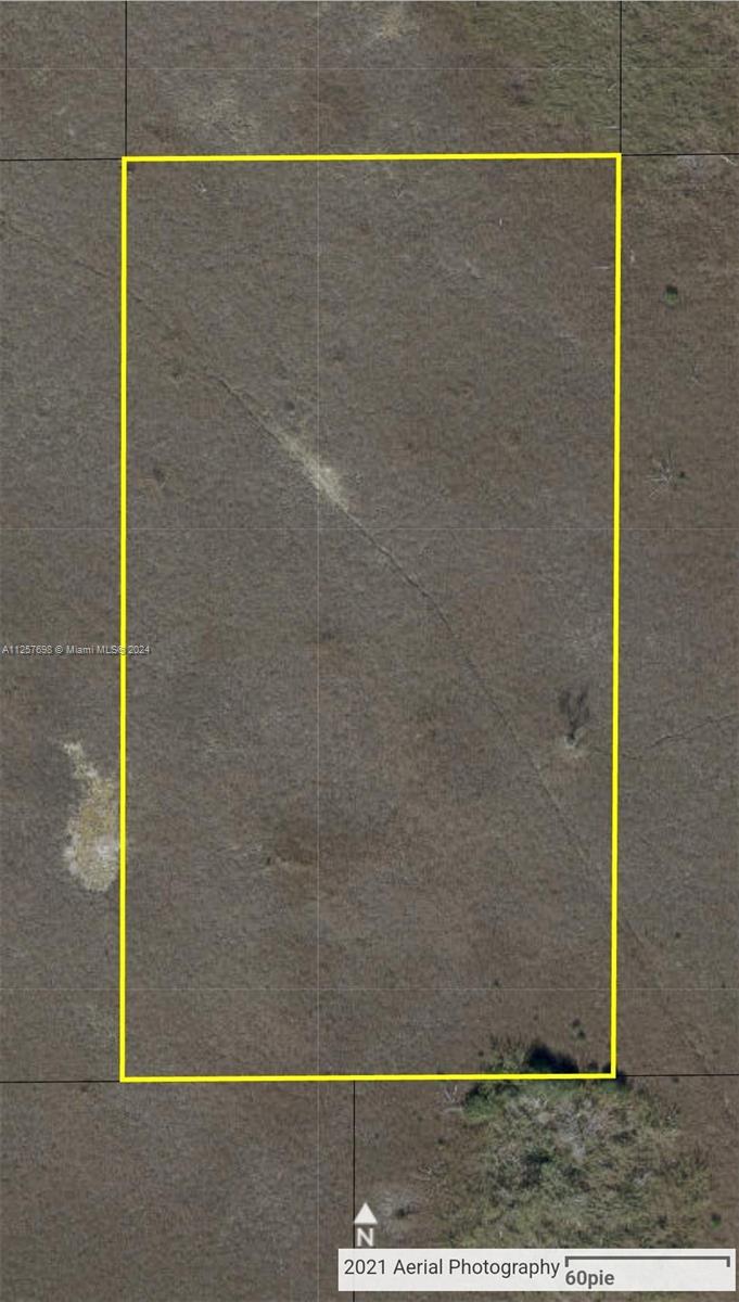 This is an aerial view of a rectangular plot of vacant land — UNINCORPORATED, Homestead FL 33035, HOMESTEAD, FL