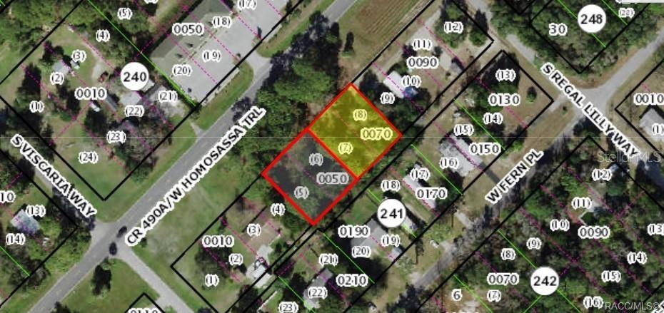 This is an aerial map showing two adjacent highlighted lots in a residential neighborhood — 7860 W HOMOSASSA TRAIL, HOMOSASSA, FL