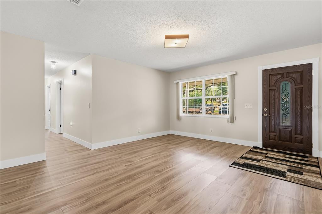 9909 JACARANDA AVENUE, CLERMONT, FL — photo 4 of 30