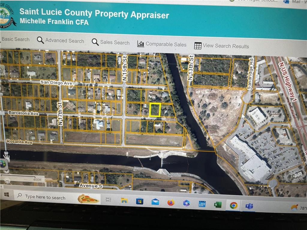 This is a satellite map showing a highlighted property parcel in Saint Lucie County, Florida — O BARCELONA AVE, Fort Pierce FL 34946, FORT PIERCE, FL