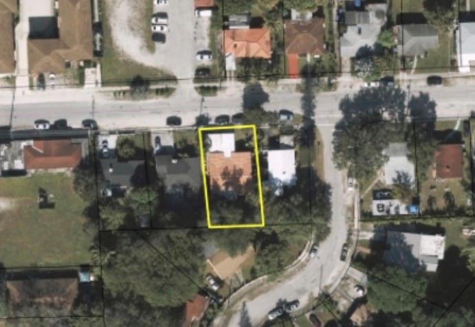 This aerial view shows a residential property highlighted by a yellow border — 154 NW 67th Street, Miami FL 33150, MIAMI, FL