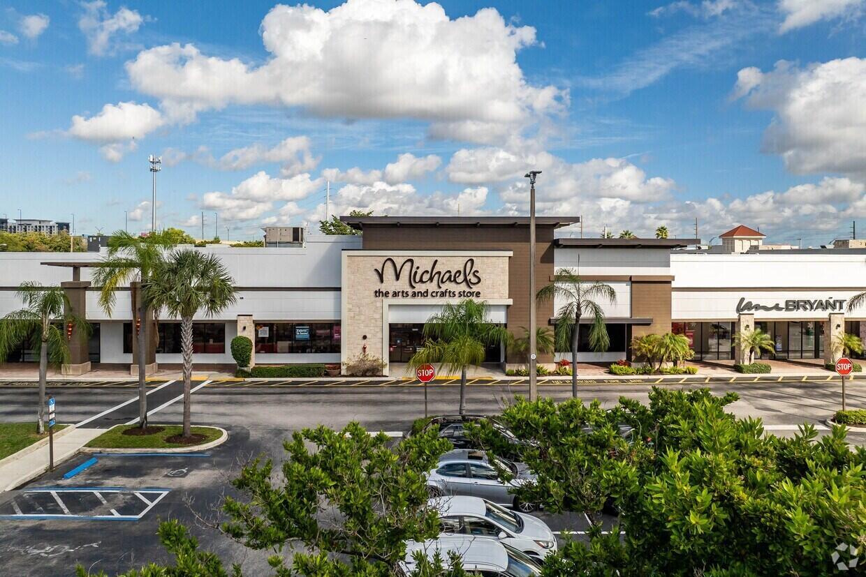 An exterior view of a Michaels store in a shopping center with a parking lot — 2054 S University Drive, Davie FL 33324, DAVIE, FL