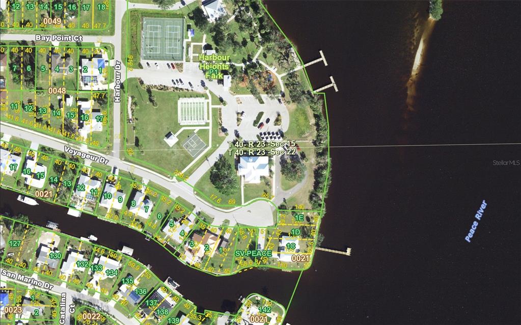 This is a satellite map showing residential lots, streets, and a park along the river — 1441 SULSTONE DRIVE, PUNTA GORDA, FL