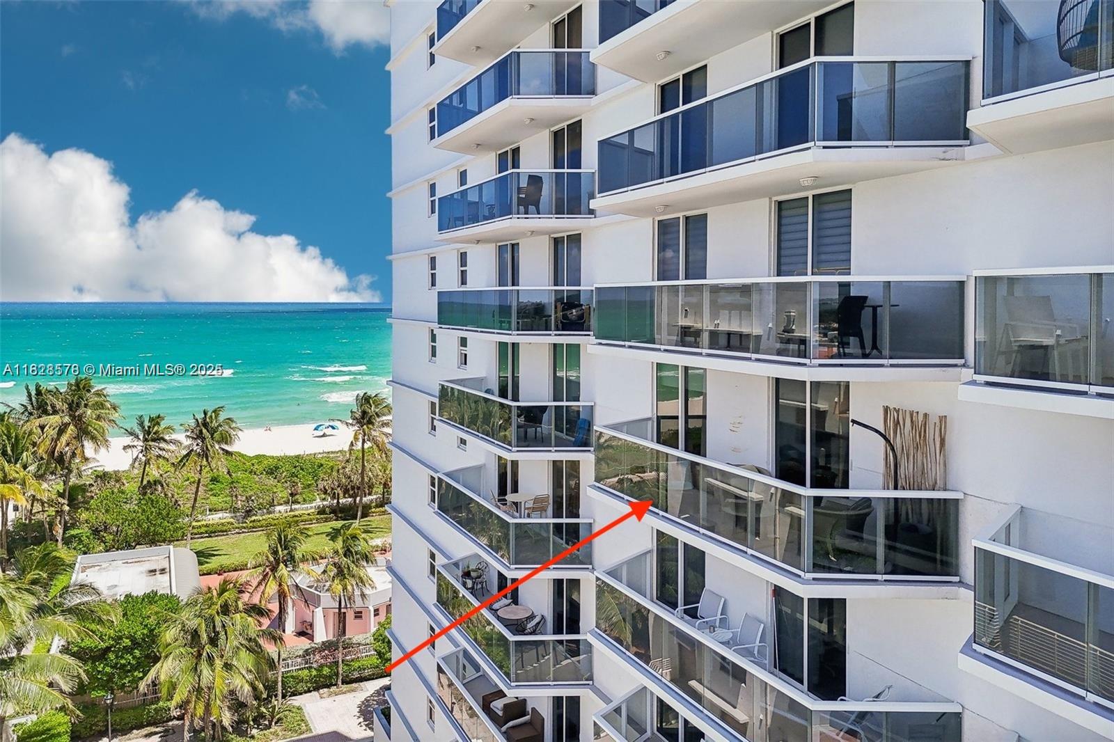 An exterior view of a high-rise building with balconies overlooking the ocean and beach — 2401 Collins Ave # 1011, Miami Beach FL 33140, MIAMI BEACH, FL