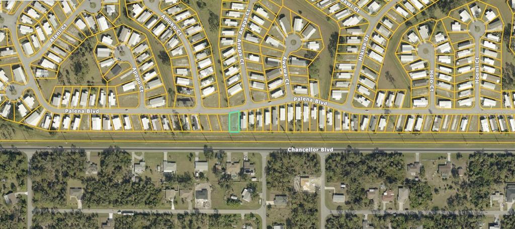 This is an aerial map view showing a highlighted residential lot within a mobile home community — 5100 PALENA BOULEVARD, NORTH PORT, FL