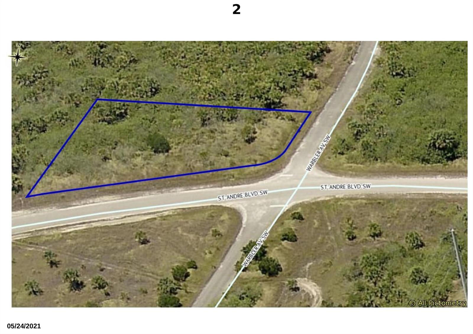 An aerial map view shows a vacant, undeveloped lot outlined in blue at a road intersection — 000 St. Andre Boulevard, Palm Bay FL 32908, PALM BAY, FL