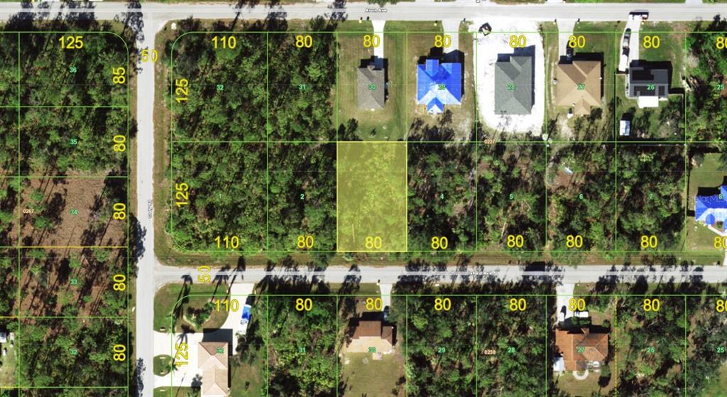 This is an aerial map showing a highlighted vacant residential lot among surrounding properties — 18334 OXFORD AVENUE, PORT CHARLOTTE, FL
