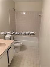 A bathroom features a vanity, a toilet, and a shower-tub combination with white tile walls — 1314 White Pine Dr # B, Wellington FL 33414, WELLINGTON, FL