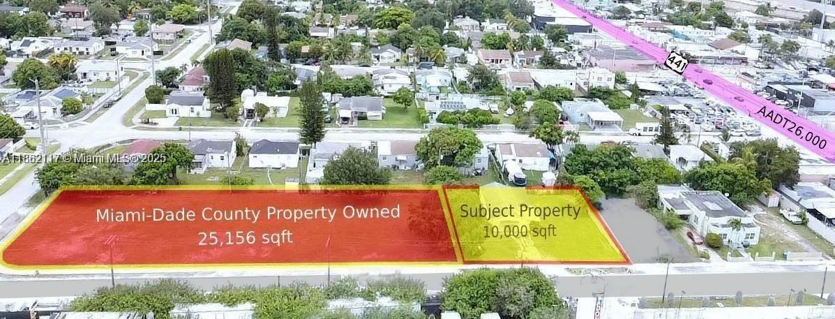 This aerial map shows two adjacent rectangular lots highlighted in red and yellow — 759 NW 73rd ST, Miami FL 33150, MIAMI, FL