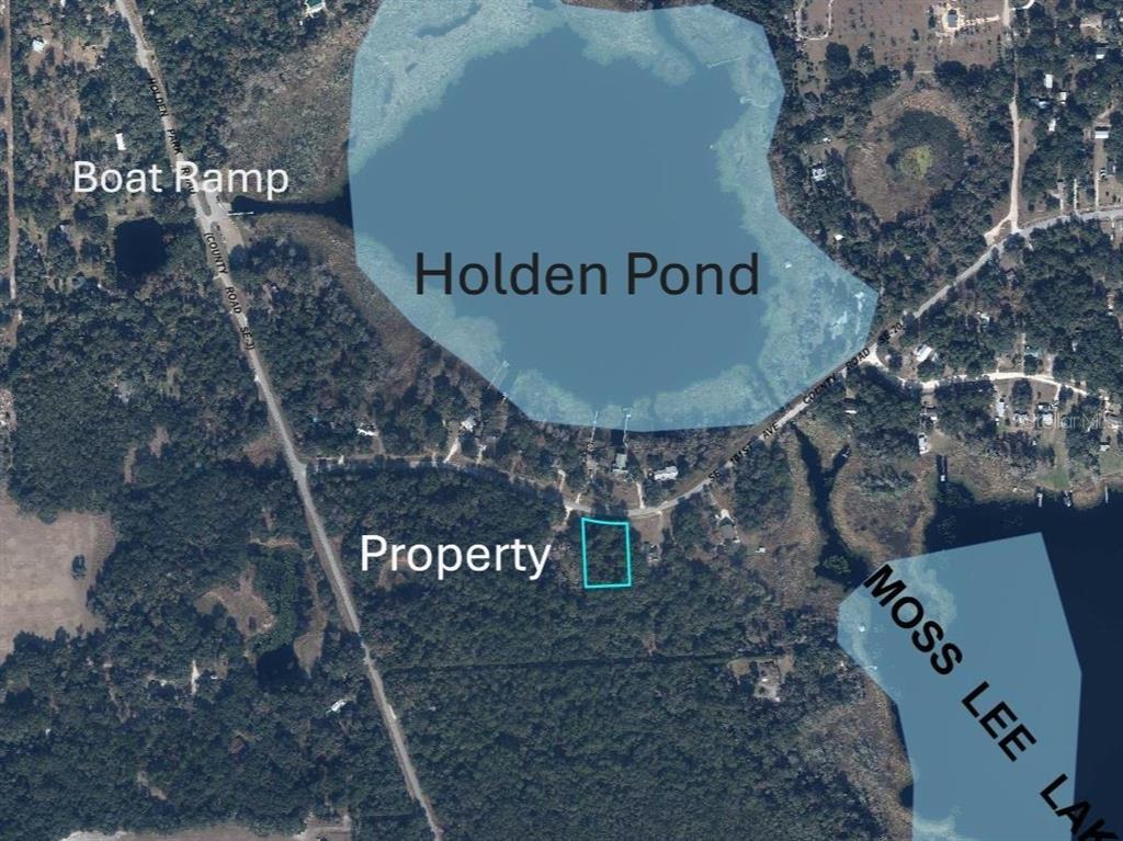 This aerial map shows a property location situated between Holden Pond and Moss Lee Lake — 24615 SE 101ST AVENUE, HAWTHORNE, FL