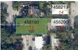 This is an aerial map view showing a highlighted rectangular land parcel with lot numbers — 2 Janet Pl, Key Largo FL 33037, KEY LARGO, FL
