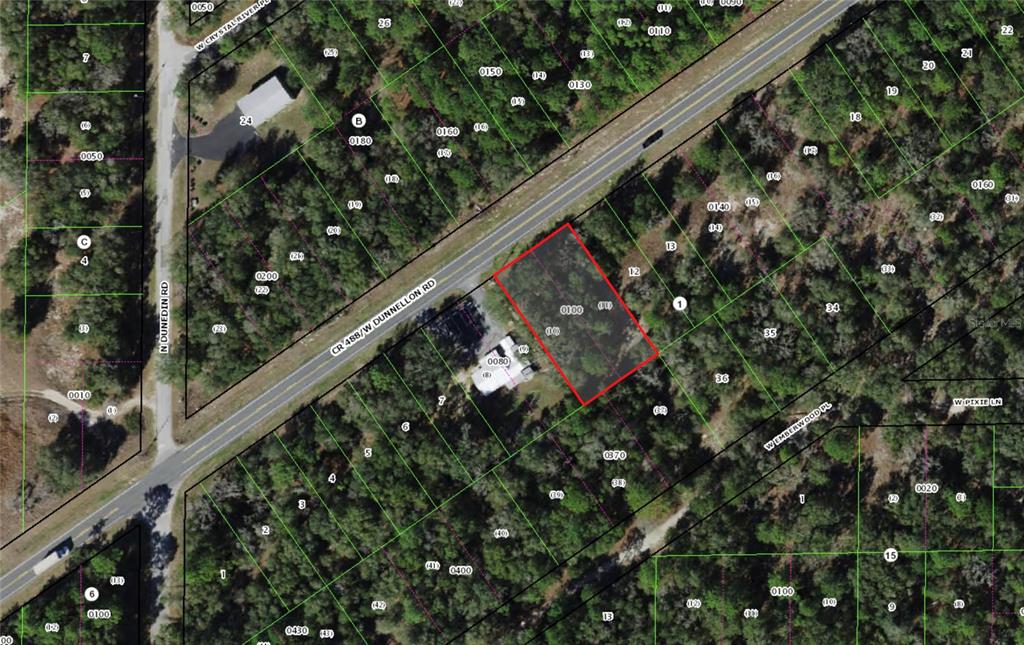 This is an aerial map showing a highlighted rectangular property lot along a road — 7622 W DUNNELLON ROAD, DUNNELLON, FL