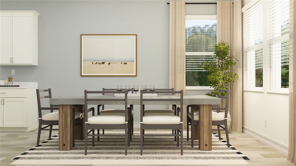 This is a digital rendering of a dining room with a concrete table and chairs — 11580 69T PLACE E, PALMETTO, FL