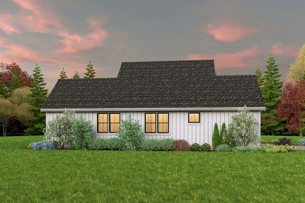 This is a digital rendering of the rear exterior of a white farmhouse-style house — 6176 FAIRWAY DRIVE, RIDGE MANOR, FL
