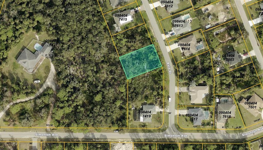 This is an aerial map showing a highlighted vacant lot among residential properties — LOT 17 RUIZ STREET, NORTH PORT, FL