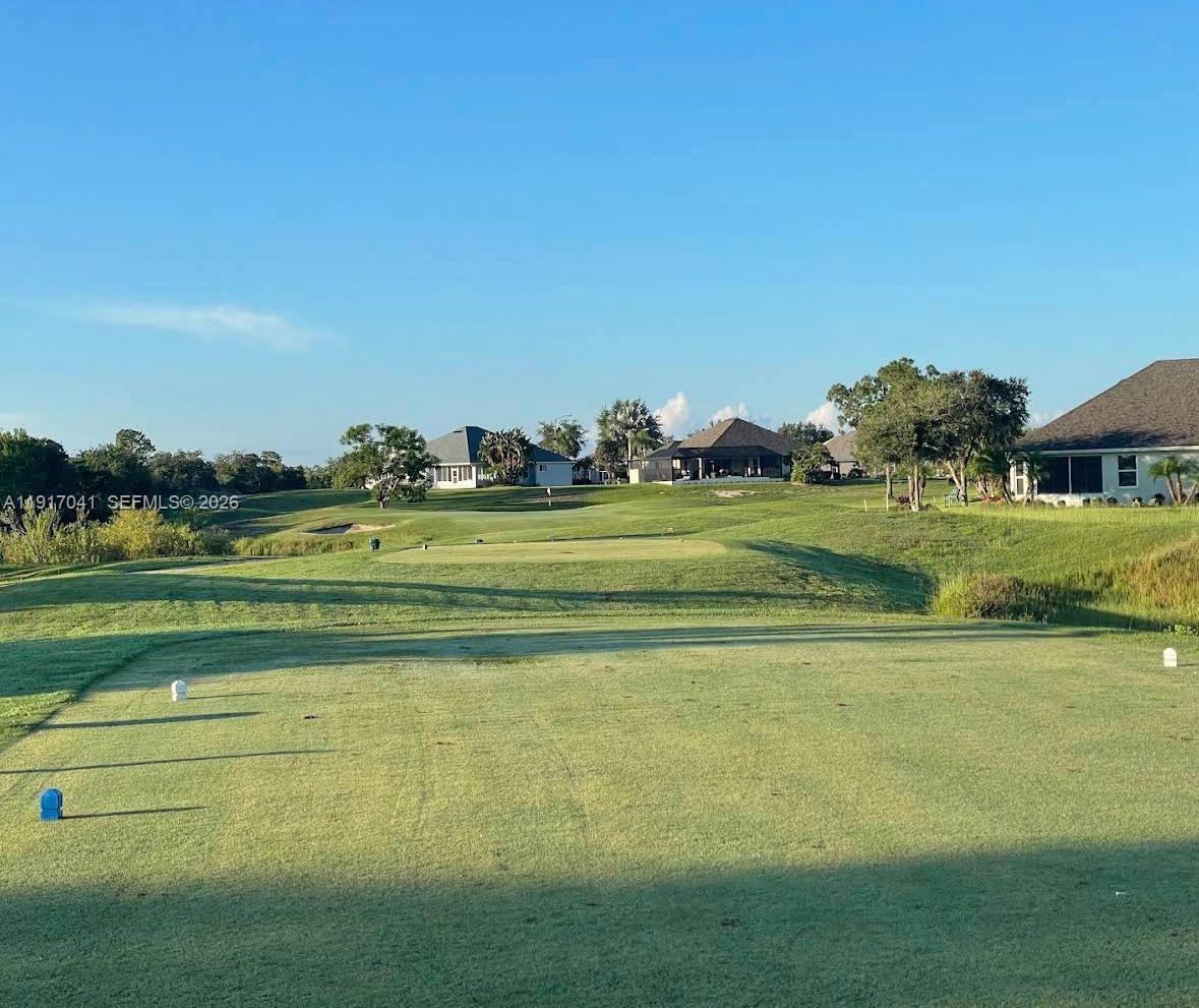 A view from a golf course tee box looking toward houses in the distance — 4525 MAJORCA DR, Sebring FL 33872, SEBRING, FL