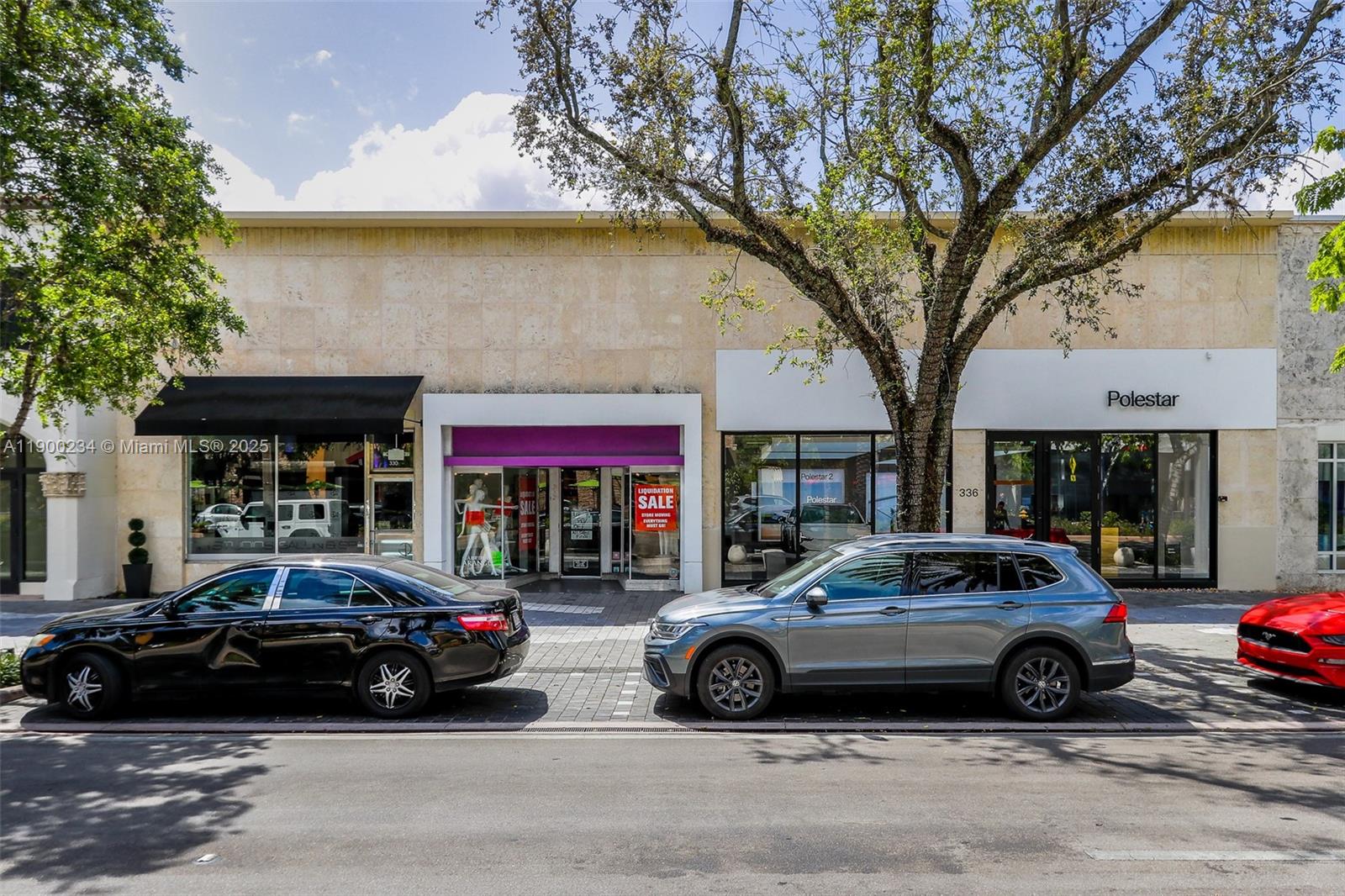 A street-level view shows a commercial building facade with storefronts, parked cars, and a tree — 332 Miracle Mile, Coral Gables FL 33134, CORAL GABLES, FL