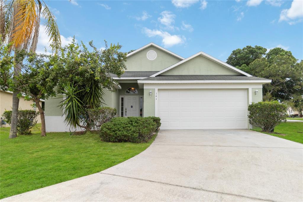 141 TEE GARDEN WAY, DAVENPORT, FL — photo 2 of 28