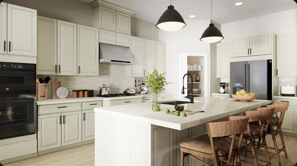 This is a rendering of a modern kitchen with light cabinets, a large island, and appliances — 10581 ECLIPSE STREET, SARASOTA, FL