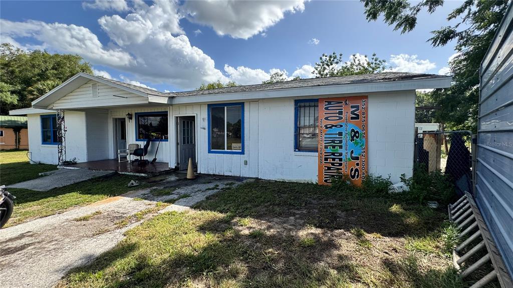 The exterior of a single-story building with a sign for an auto and tire repair shop — 5050 S PINE AVENUE, OCALA, FL