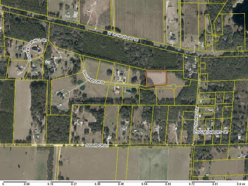 This is an aerial map showing a highlighted rectangular land parcel along a residential road — Tbd SW Windsor Court, FL 32024, FL