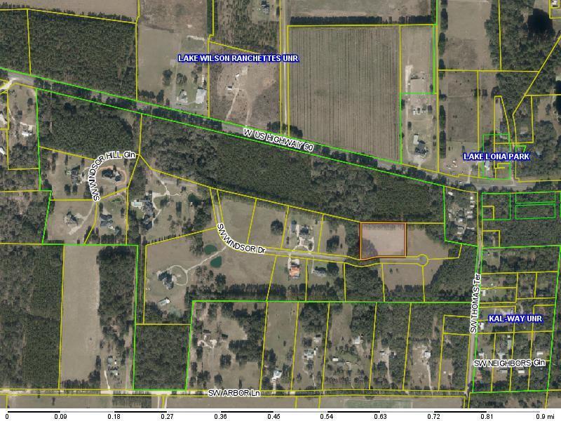 This is an aerial map showing a vacant lot highlighted in orange within a residential area — Tbd SW Windsor Court, FL 32024, FL