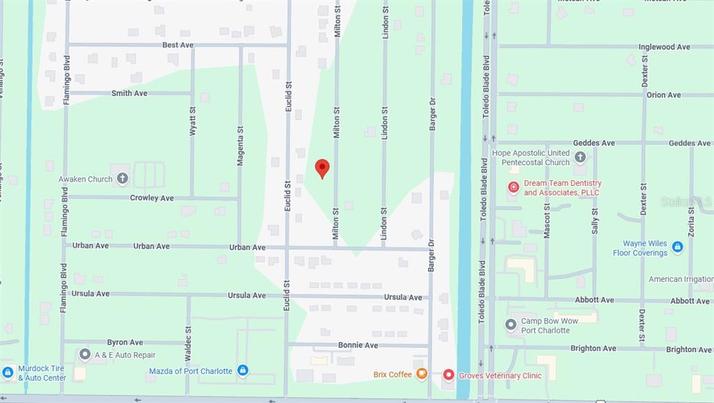 This is a digital map showing streets and businesses in a residential area — 387 MILTON STREET, PORT CHARLOTTE, FL