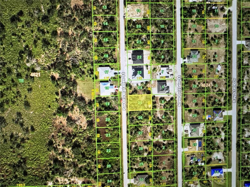 This is an aerial map showing residential lots, streets, and existing houses in a neighborhood — 10444 PORT EVERGLADES STREET, PORT CHARLOTTE, FL