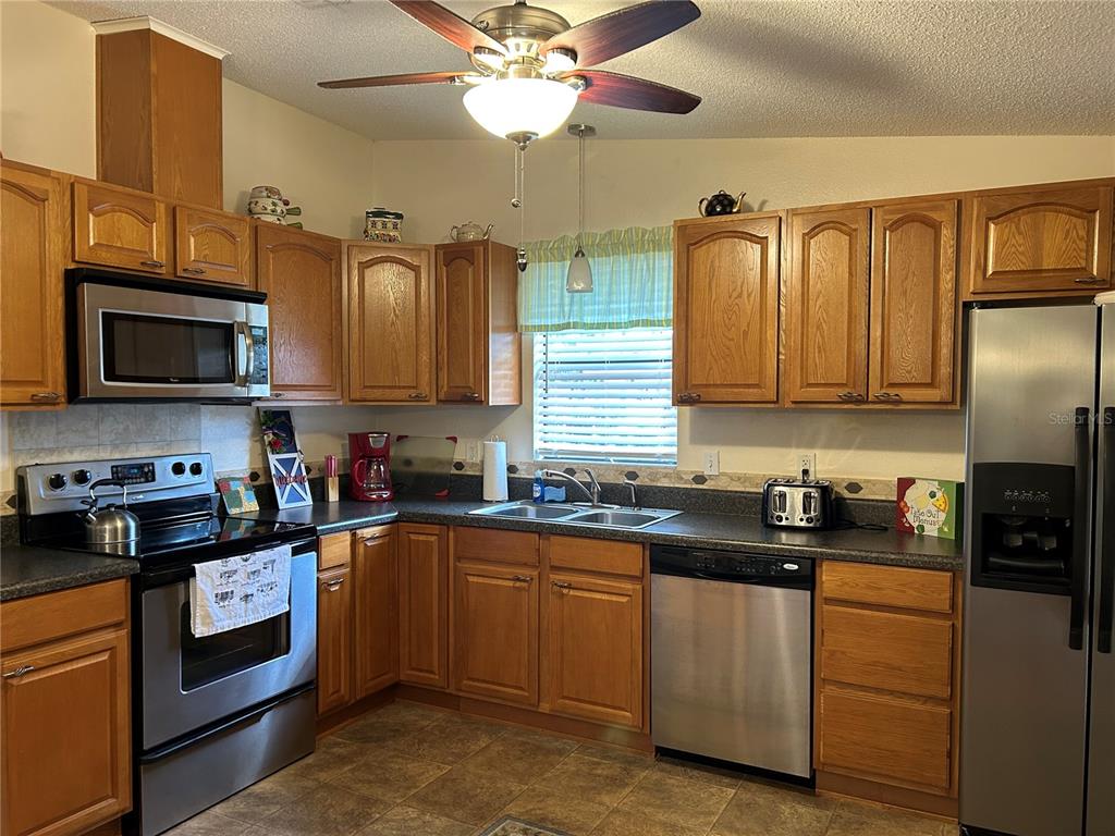 1709 E SCHWARTZ BOULEVARD, LADY LAKE, FL — photo 2 of 16