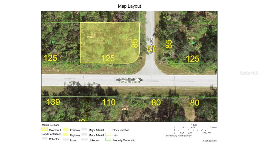 This is a map layout showing property lot lines and dimensions along Chamberlain Boulevard — 13018 CHAMBERLAIN BOULEVARD, PORT CHARLOTTE, FL