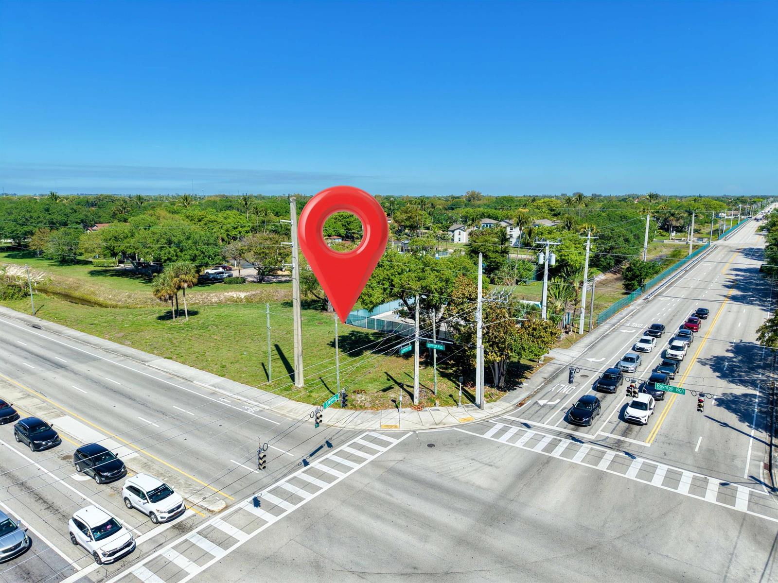 An aerial view shows a vacant corner lot marked with a red location pin — Xxxx Lawrence Road, Boynton Beach FL 33436, BOYNTON BEACH, FL