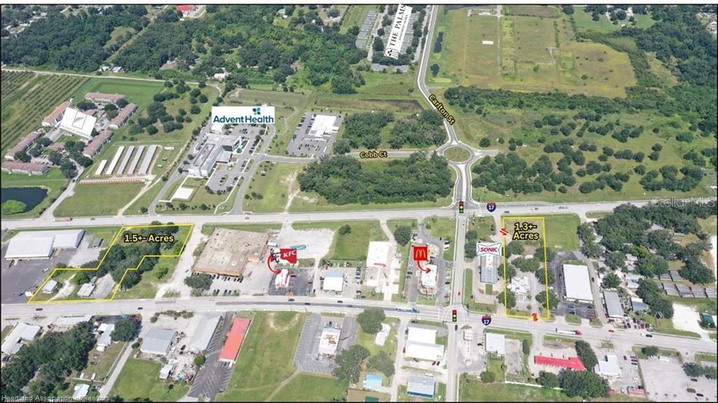 An aerial map shows two highlighted parcels of land near commercial businesses and a roundabout — 939 S 6TH AVENUE, WAUCHULA, FL
