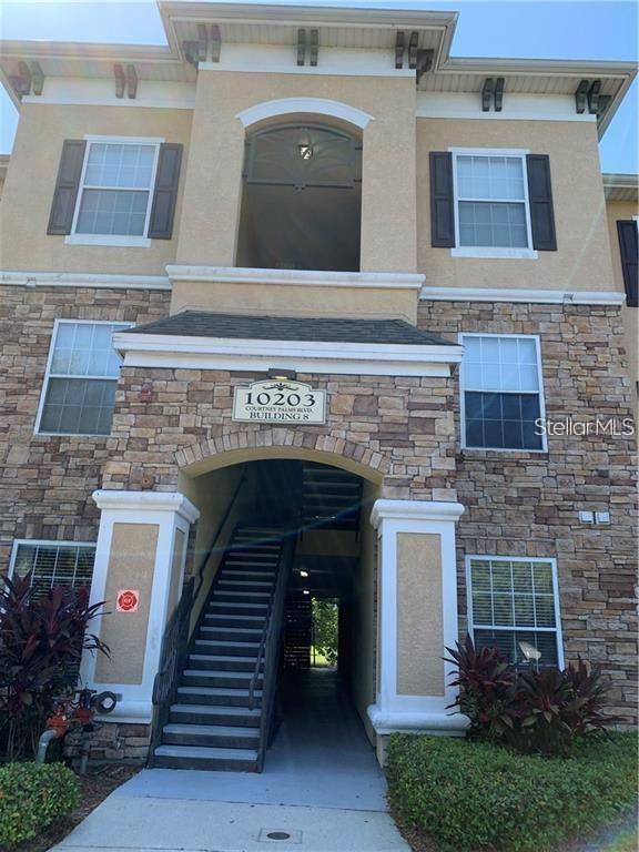 10203 COURTNEY PALMS BOULEVARD UNIT 201