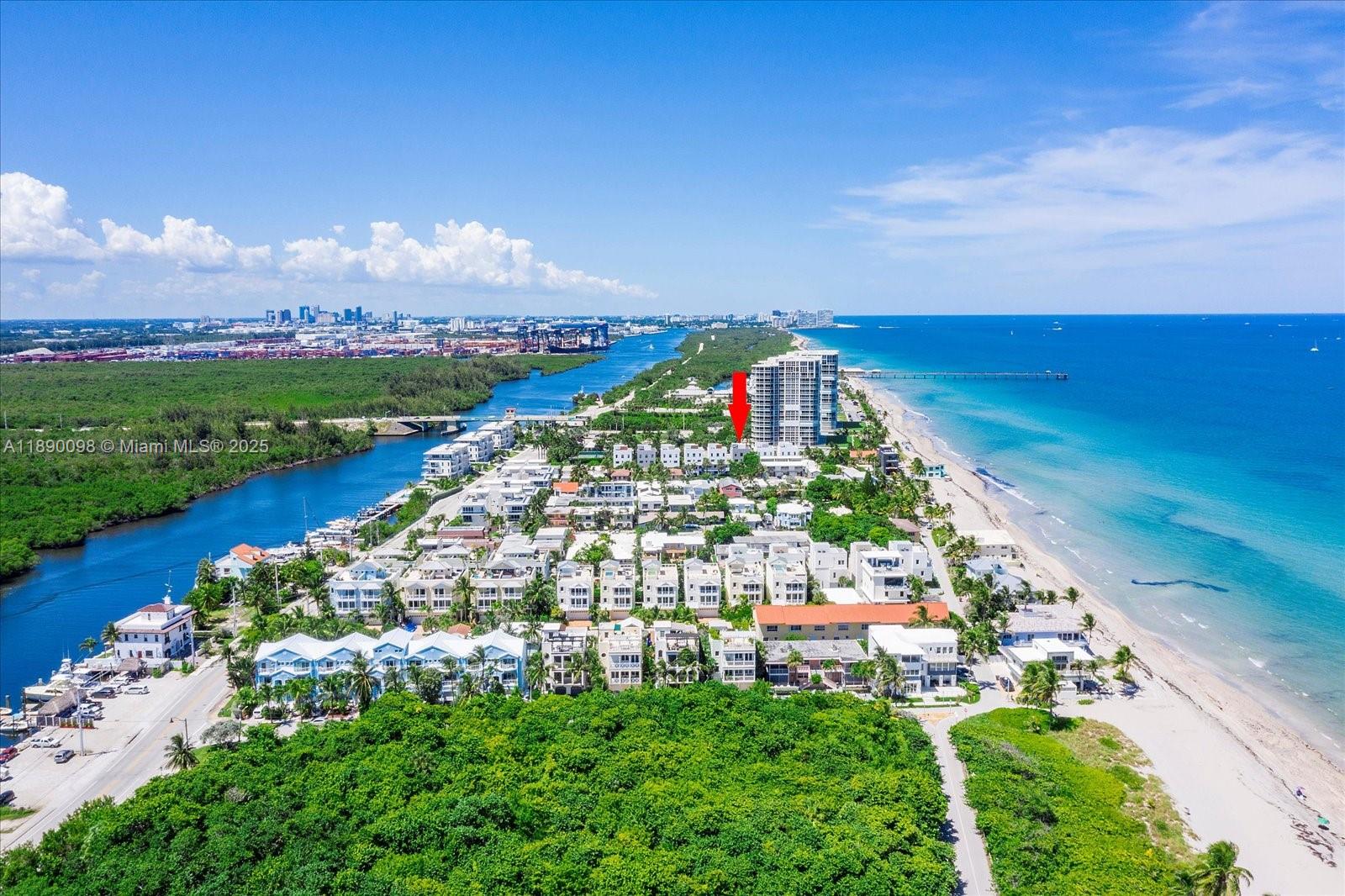 An aerial view shows a coastal neighborhood with a red arrow pointing toward a building — 332 Balboa St, Hollywood FL 33019, HOLLYWOOD, FL