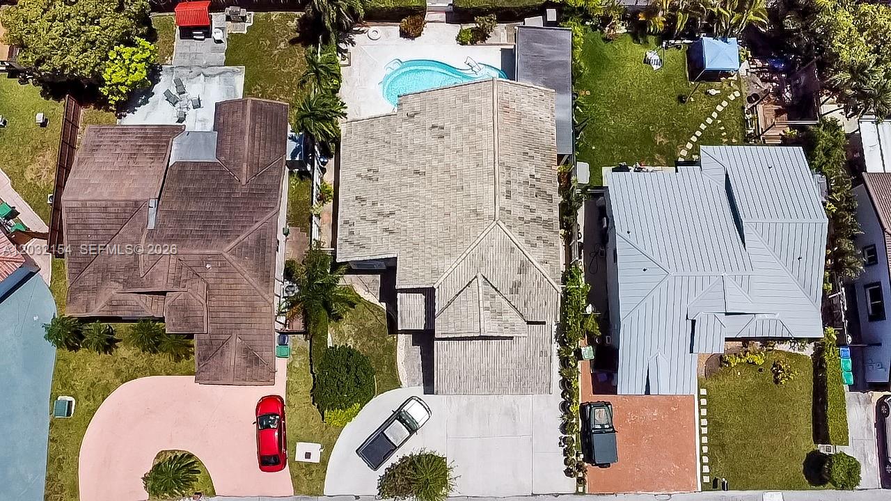 An aerial view shows three residential houses with driveways, pools, and landscaped yards — 8532 SW 211th Ter, Cutler Bay FL 33189, CUTLER BAY, FL