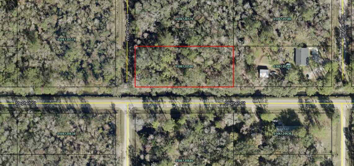 This is an aerial map showing a rectangular, wooded parcel of land outlined in red — 5020 Stephen Street, FL 32145, FL