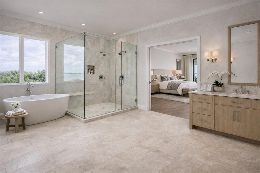 A primary bathroom features a freestanding tub, a glass-enclosed shower, and a wooden vanity — 6043 BAYOU GRANDE BOULEVARD NE, ST PETERSBURG, FL