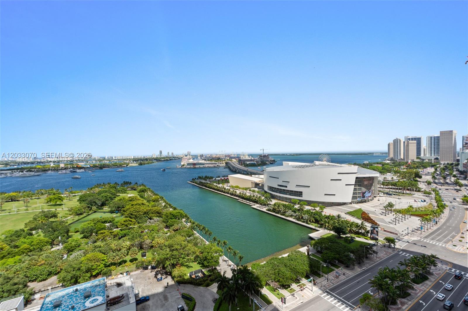 An elevated view shows a park, a waterway, and the Kaseya Center in Miami — 900 Biscayne Blvd # 2304, Miami FL 33132, MIAMI, FL