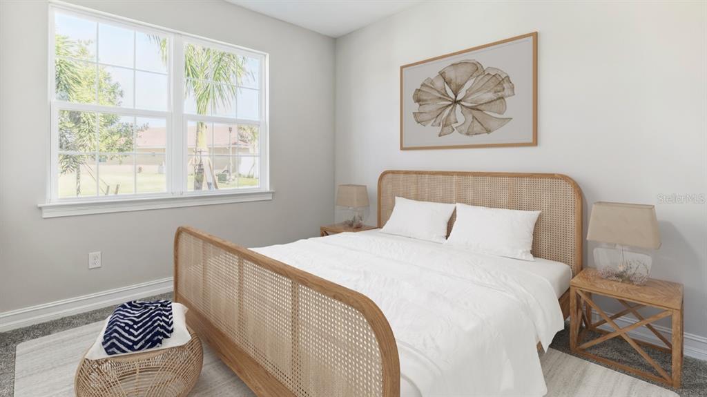 This is a digital rendering of a bedroom featuring a rattan bed frame and neutral decor — 26296 CORAL LAKES DRIVE, PUNTA GORDA, FL